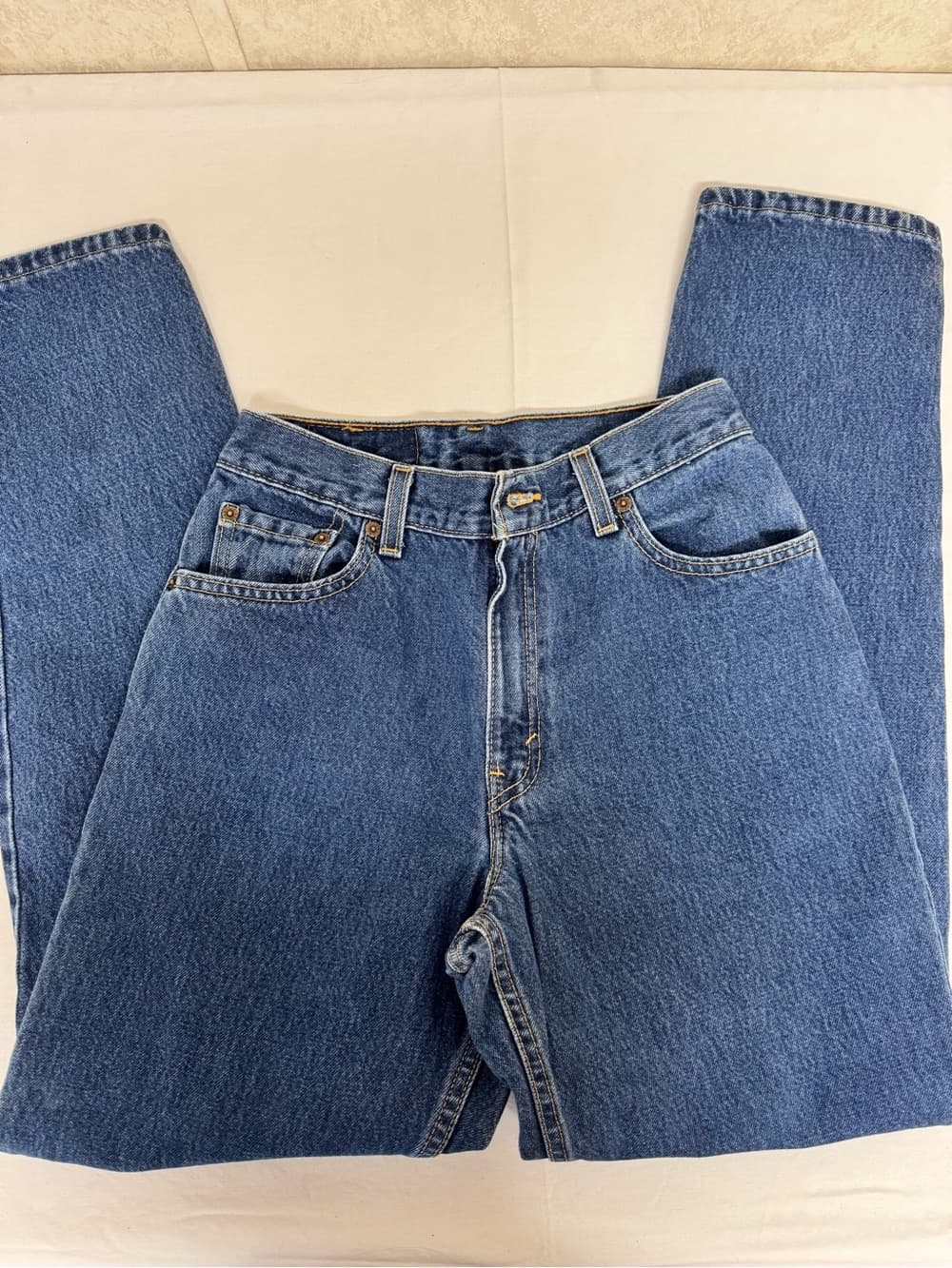 Levi's 550 Relaxed Fit Light Blue Jeans with Gold Stitching